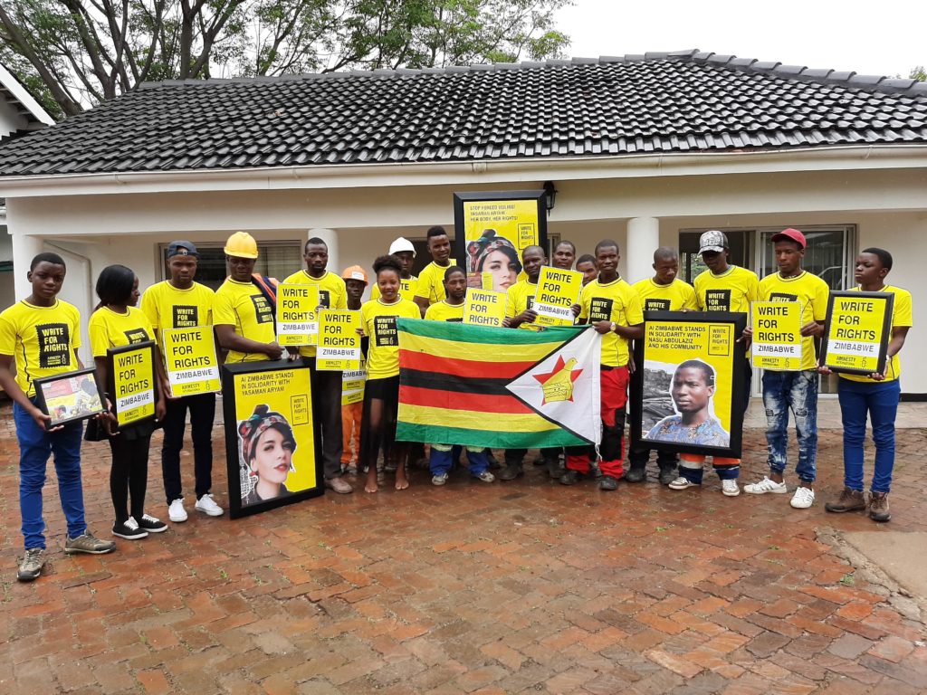 Members and supporters take part in Amnesty's annual Write for Rights letter writing marathon at AI Zimbabwe offices, 10 December 2019. © Amnesty International

